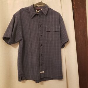 The North Face Men’s Blue with pattern button up shirt.  Size: M.  Front pocket.